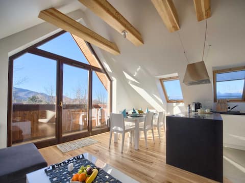 Superior apartment with fireplace & mountain view