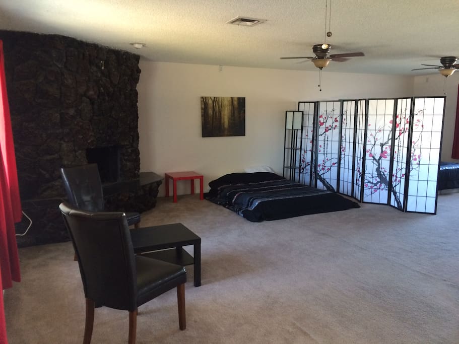 Upstairs is nearly 1000 sq ft with huge bedroom, bathroom and walk in closet. Pictures shown with 2 beds, will put in 3rd if you have more than 4 guests in your party. Sorry boxsprings won't fit upstairs so mattresses are on floor except the Kingbed which had split boxsprings.