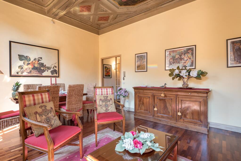 Living room, ceiling paints from 1200 a.C. World Heritage building, view historical center, A/C each room