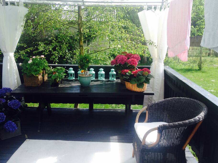 Sunshine on the terrace and shade under the pavillion
