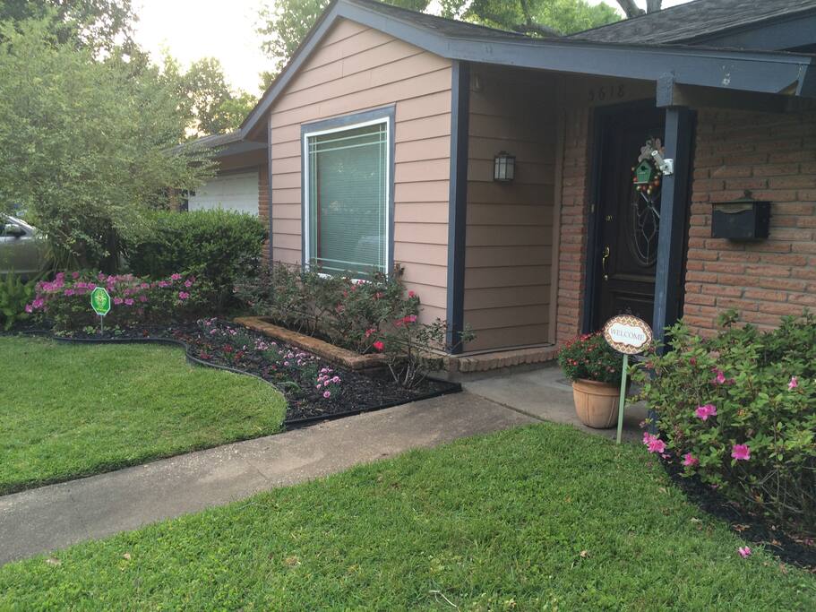 Flowerbeds and picture window