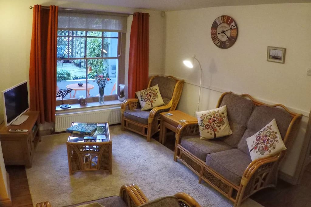 Comfortable seating indoors - patio area just outside.
