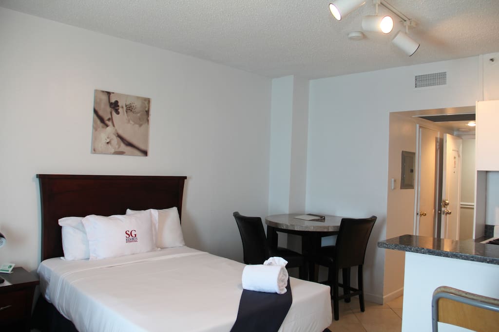 Two double beds available with dining table.
