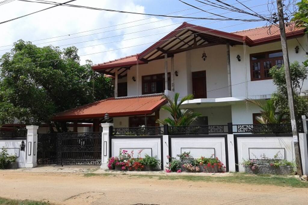 view of the guest house from across the road