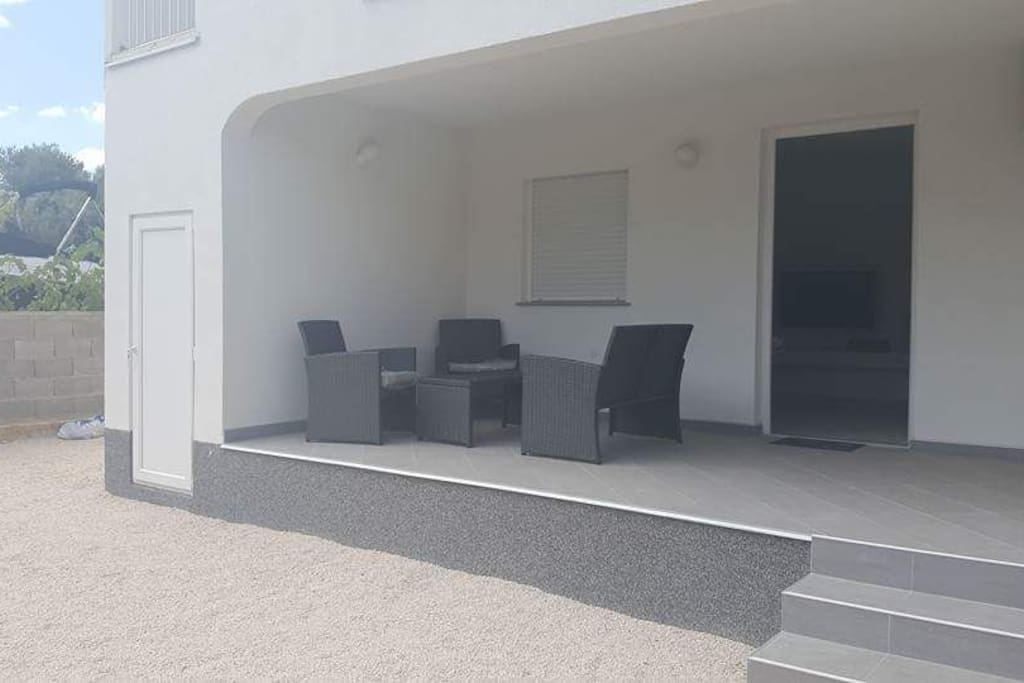 terrace of the apartment. the apartment is located in a peaceful dead end street with very little traffic