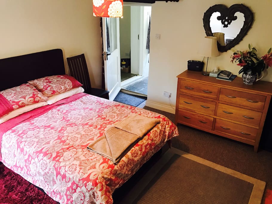 Main Bedroom with luxury double-bed, satellite TV, wardrobe bed lights and radio