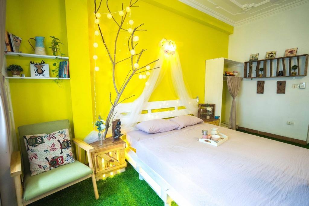 Bedroom on the third floor with balcony overlooking West Lake