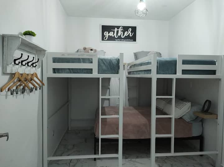 Bedroom 1 - Two upper Twin bunk beds and one Full size bed with master bathroom access