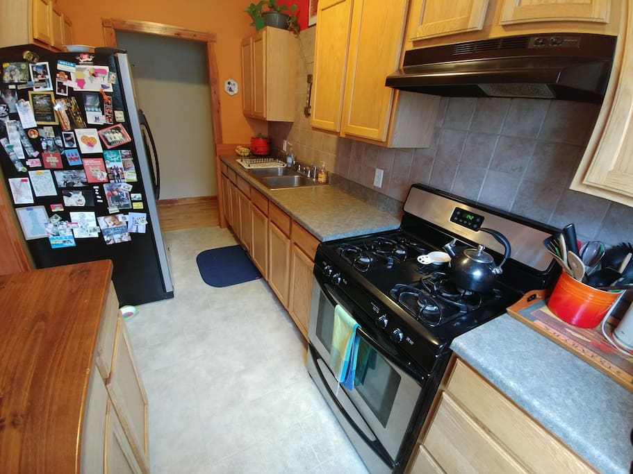 Fully equipped kitchen with large refrigerator