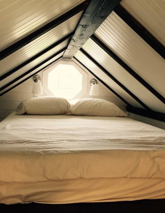 Bluebonnet's sleeping loft features a queen-size mattress