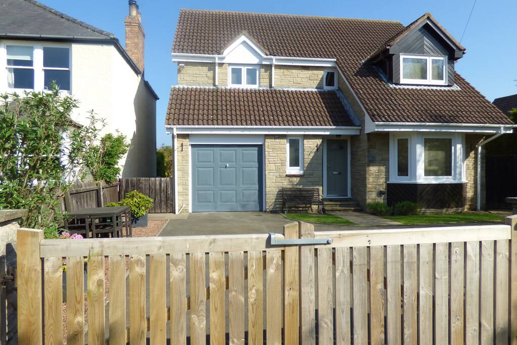 Large 4 bedroomed detached house in the heart of High Newton by the Sea. Private, secure parking for 3 cars.