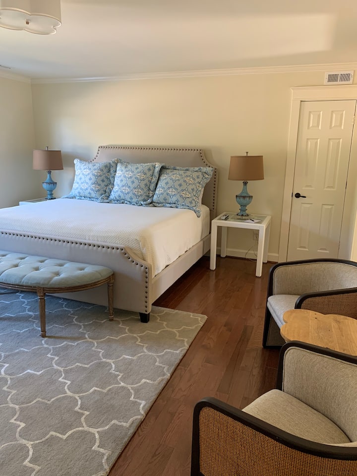 The Oak Room has a plush king size bed, comfortable seating and a 58in Ultra HD Smart TV with tilt mount. The spacious walk in closet doubles as an extra storage space and a private changing area. 