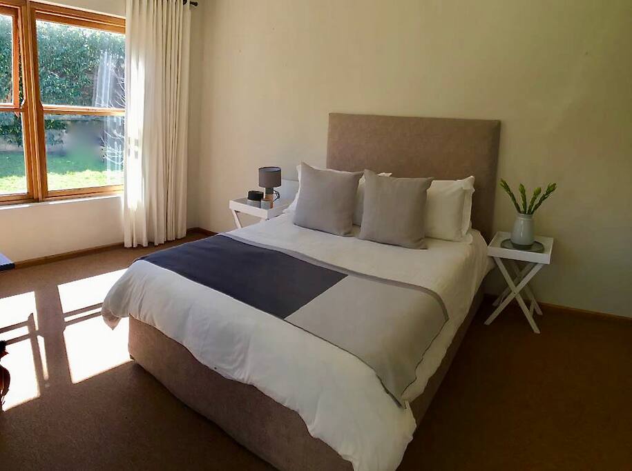 Bedroom 1 leading onto front garden (mountain view)