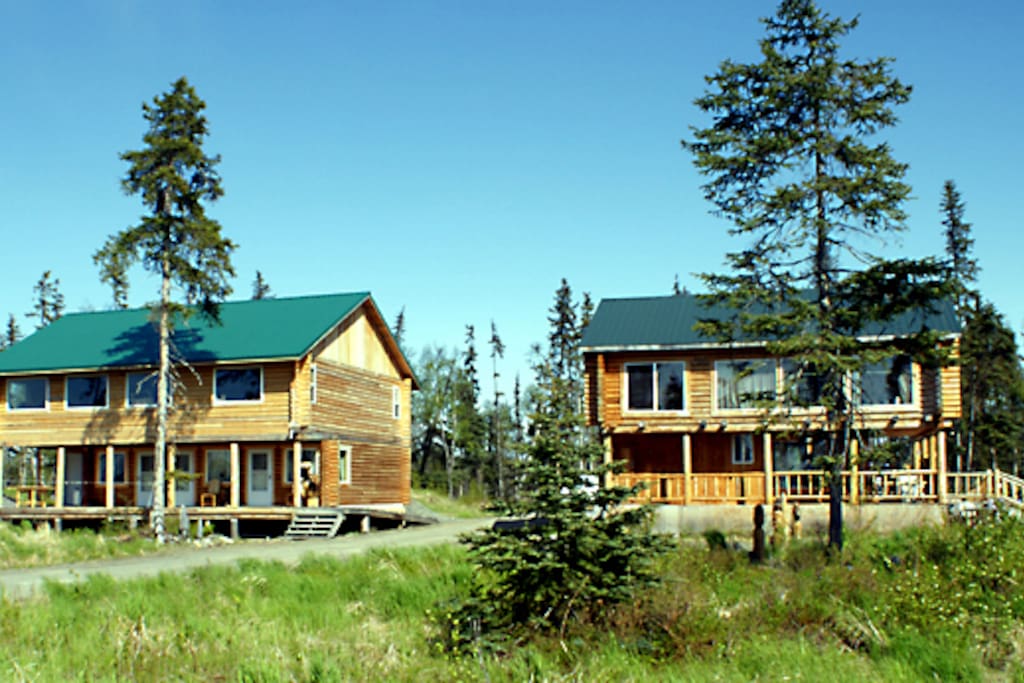 2 beautiful, hand built log lodges furnished with custom hand crafted log furniture in each room! Incredible scenery out the front door of Cook Inlet and the Mountains. Centrally located between Ninilchik and Homer.