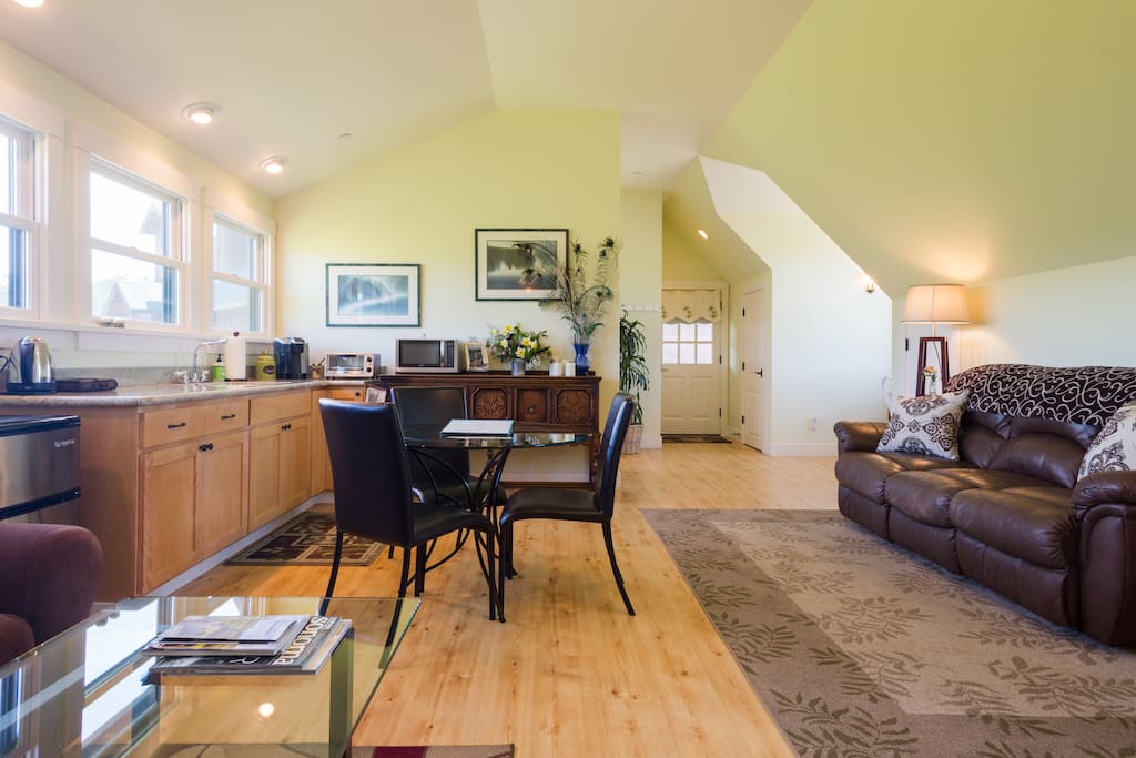 Kitchen area with small fridge, microwave, and Keurig Coffee maker