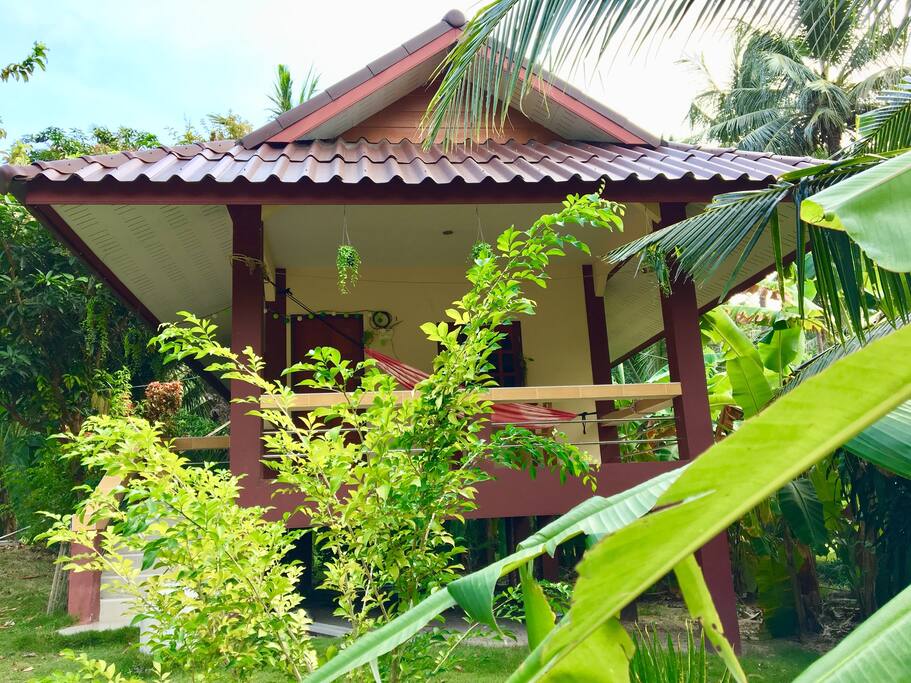 The lovely green scenery around the house.
