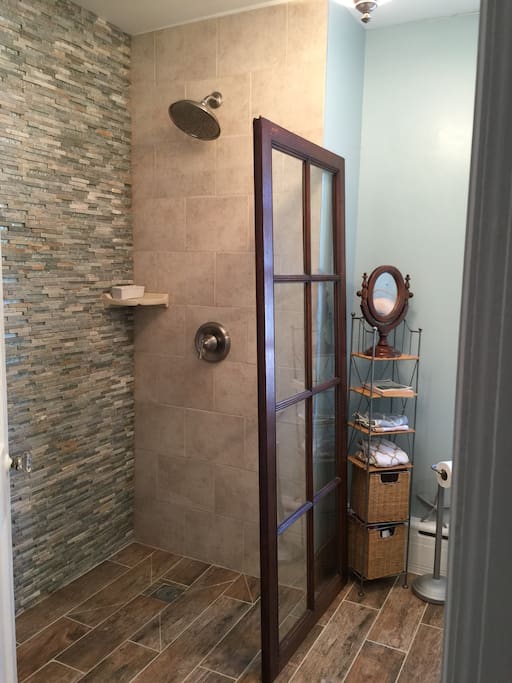 Newly Remodeled Upstairs full bathroom with walk-in shower.