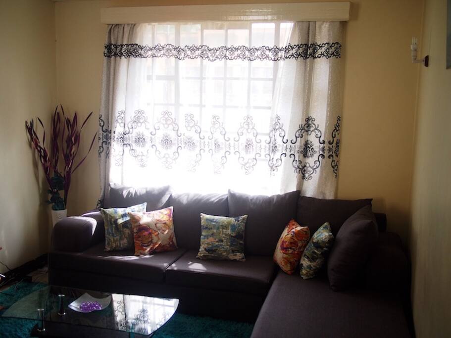 Spacious living room with internet, cable and reading/ meals table