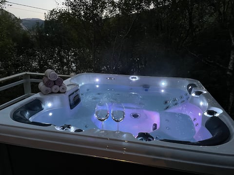 Stay in a great cabin and enjoy a hot tub in great nature