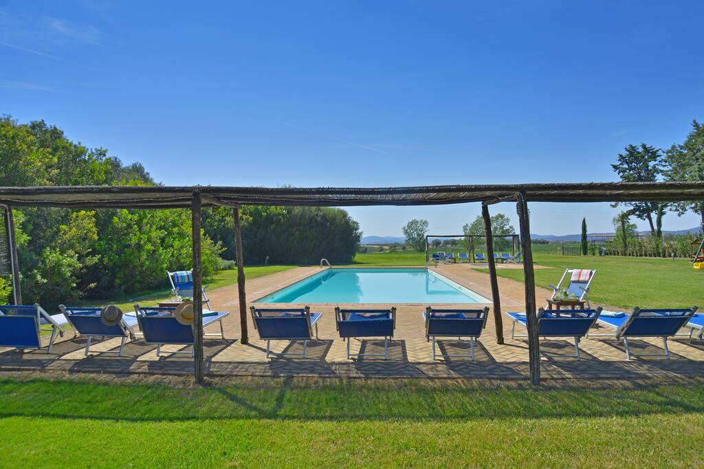 Lounge chairs under a pergola