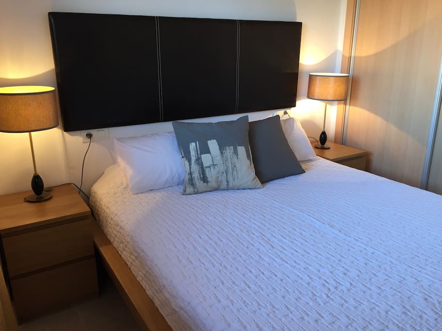 Master bedroom with king size bed, en suite bathroom and TV