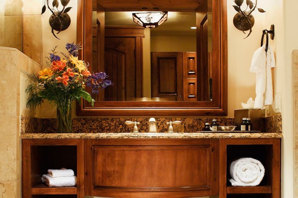 Get ready for your day in the pristine bathroom.