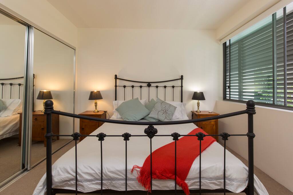 Bedroom with double wardrobe, hangers and plenty of wardrobe space.