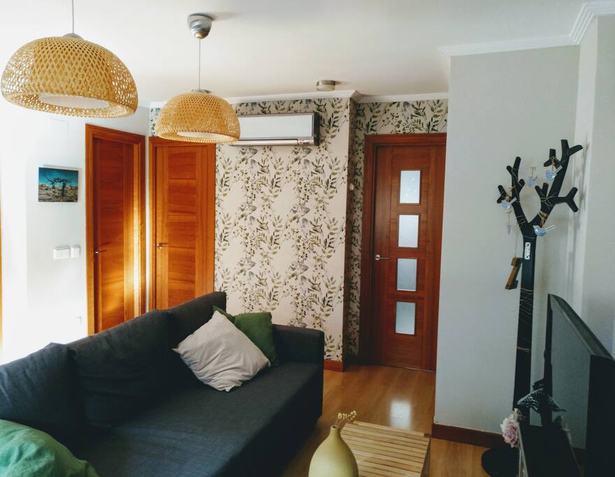 Salón comedor con sofá cama