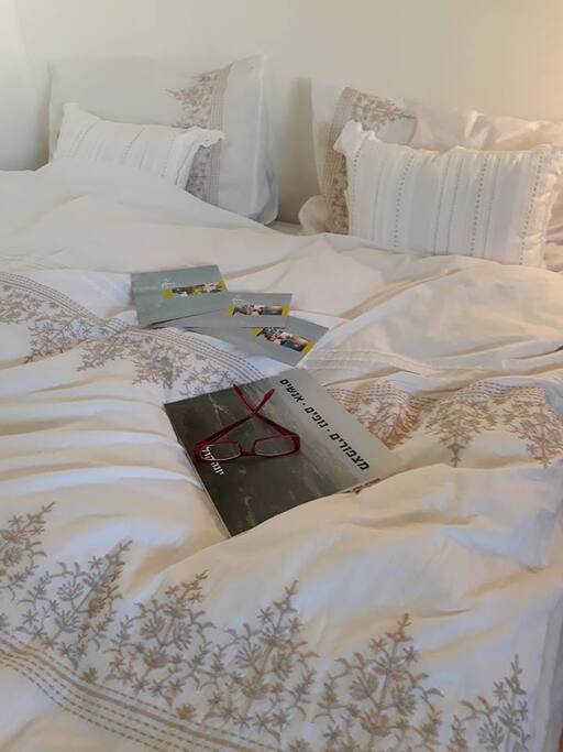 Bed room Queen double bed 150/200one side next to a wall, cozy furnished