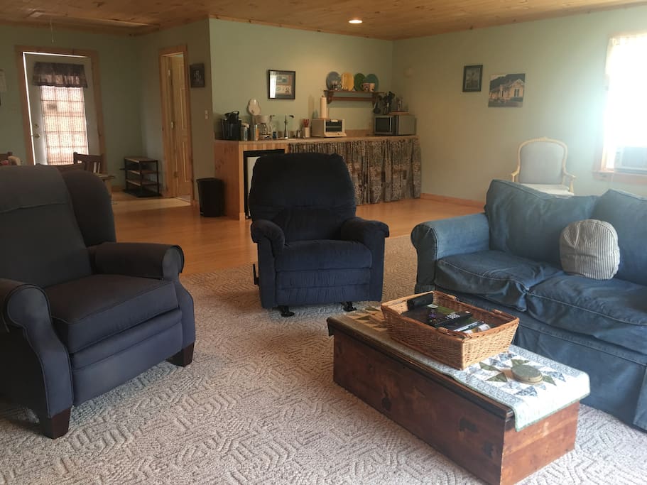 Living space with two recliners, love seat. Relax and enjoy Netflix, prime, and other channels on the ROKU.