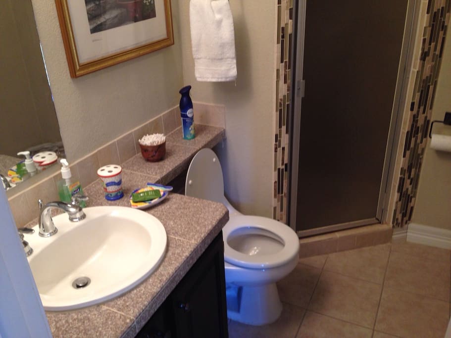 Private, en suite bathroom with shower
