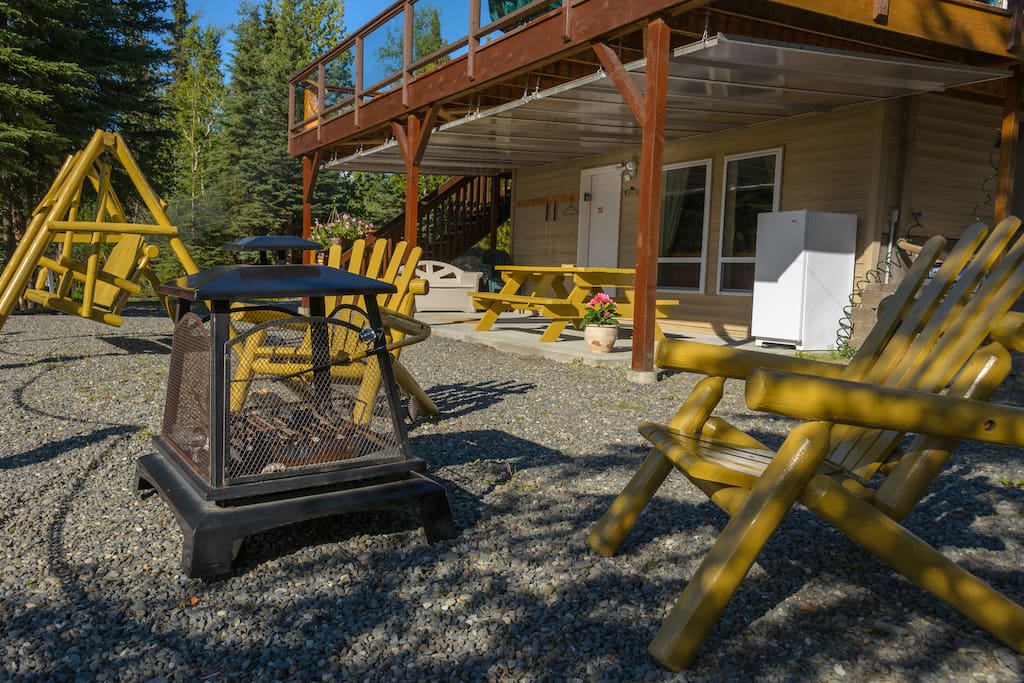 Outdoor furniture with fire pit and freezer for your catch
