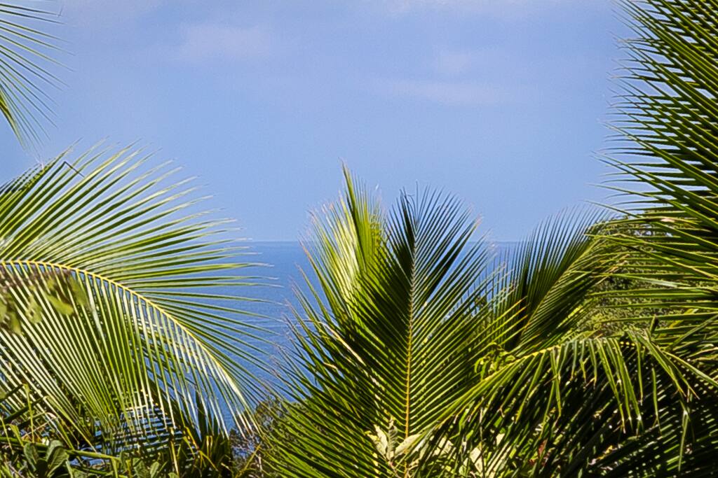 The view from the balcony. A distant view of the ocean.