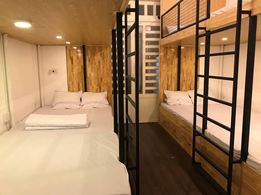 Single bed in the Front Beach dorm room