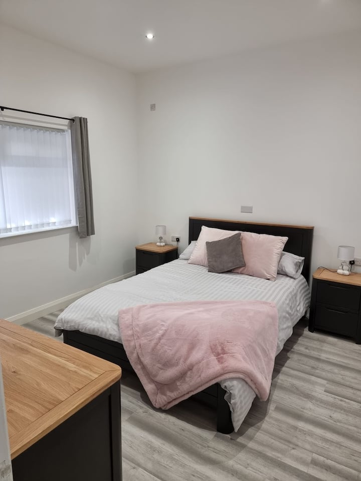 The main bedroom with a king size bed.