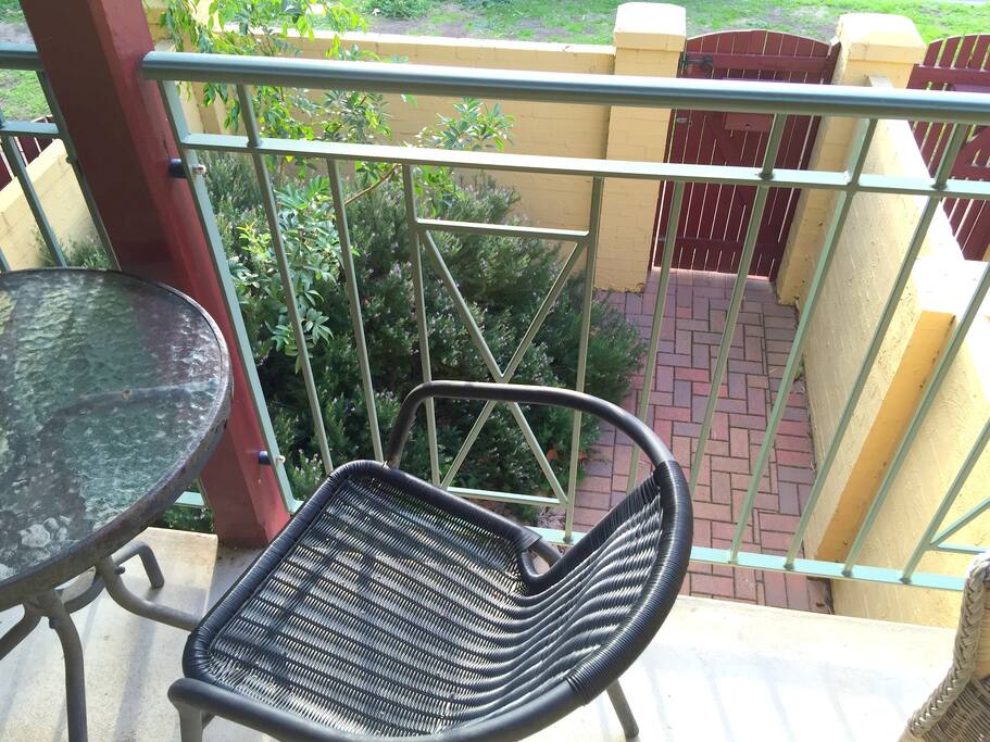 Balcony to north from queen bedroom looks to front gate. Sunny spot in winter but shaded in summer.