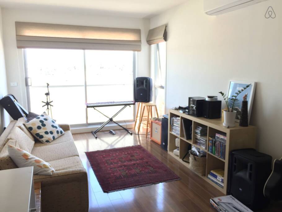 Lounge from the kitchen, out to the start of the large balcony