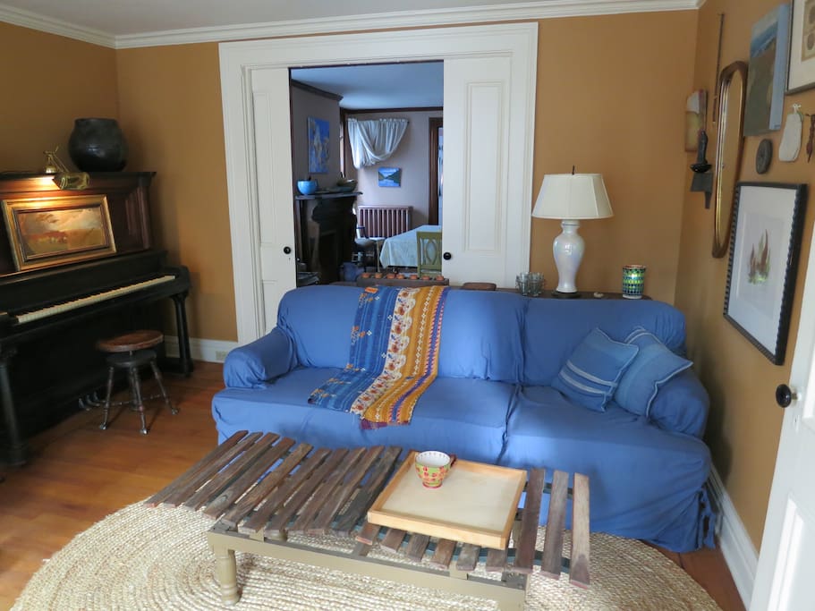 living room with piano