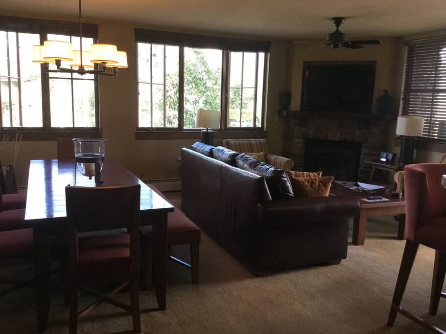 Living/dining room with balcony and great views of Spud Mountain