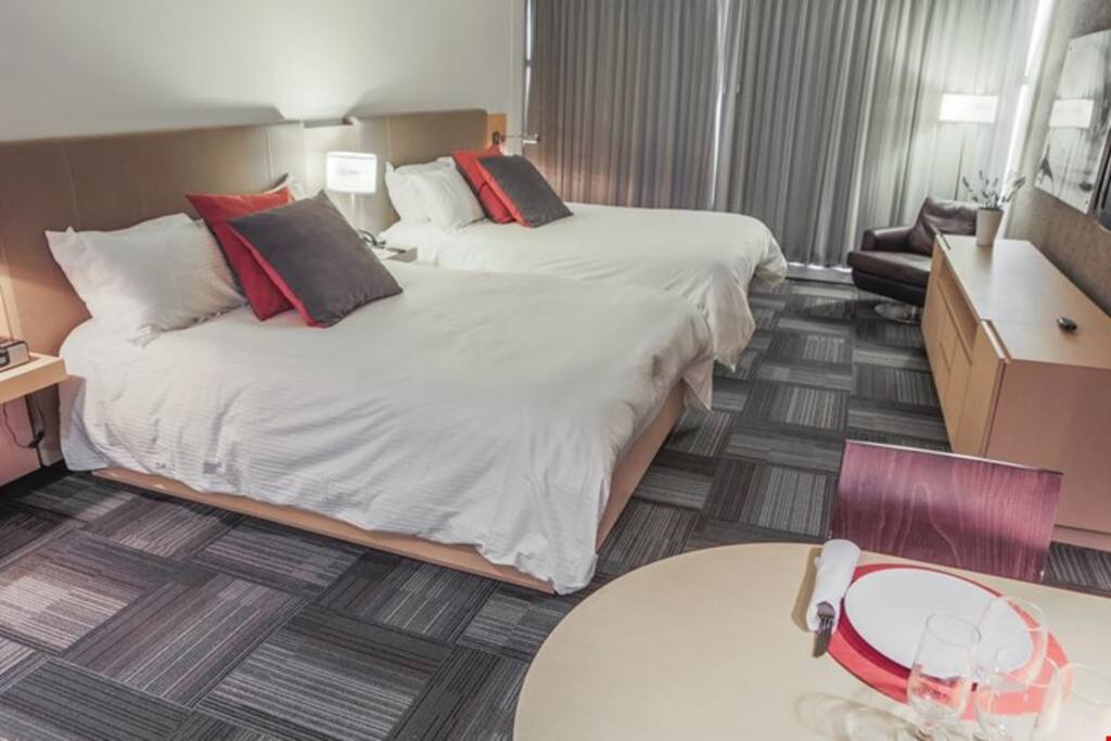 Relax and unwind in one of the comfortable queen beds.