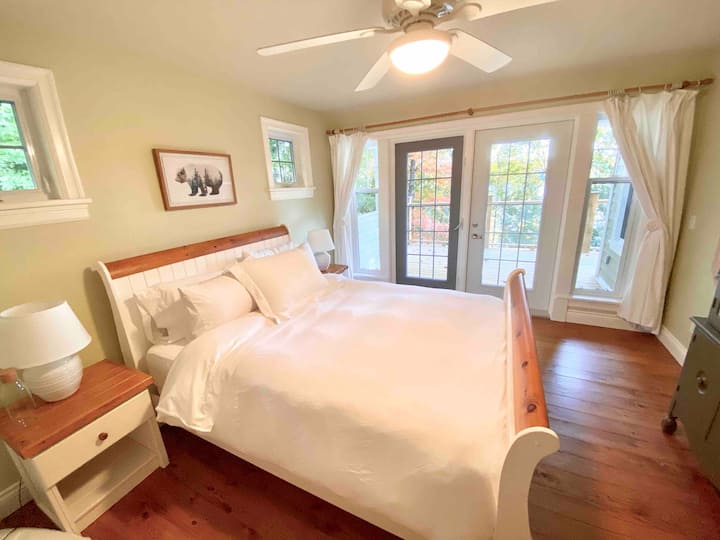 The Deck Bedroom has perfect lakeside views and opens onto a semi-private balcony.