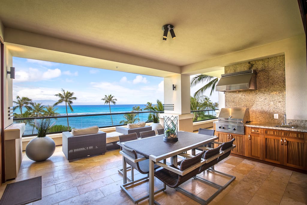 Large outdoor living and dining area with one of a kind ocean views.