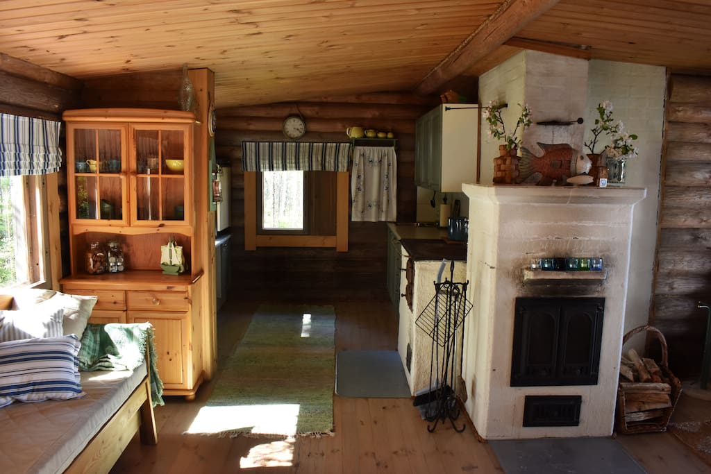 Kitchen and living room area with fireplace