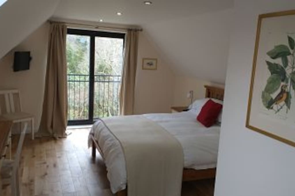 2nd floor bedroom with Juliette balcony overlooking River Doon