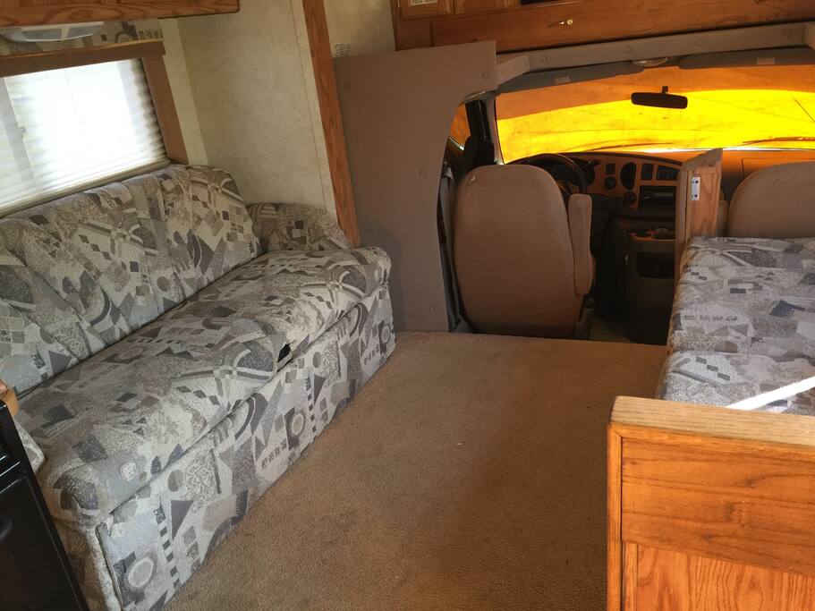 This couch converts into a bed that sleeps two children.