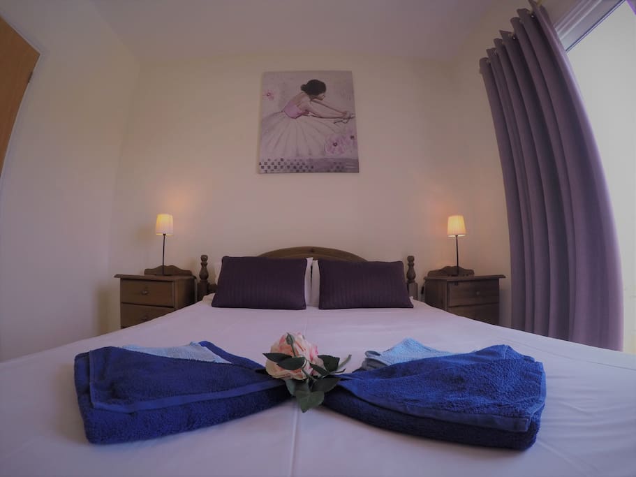 Master bedroom in shades of purple