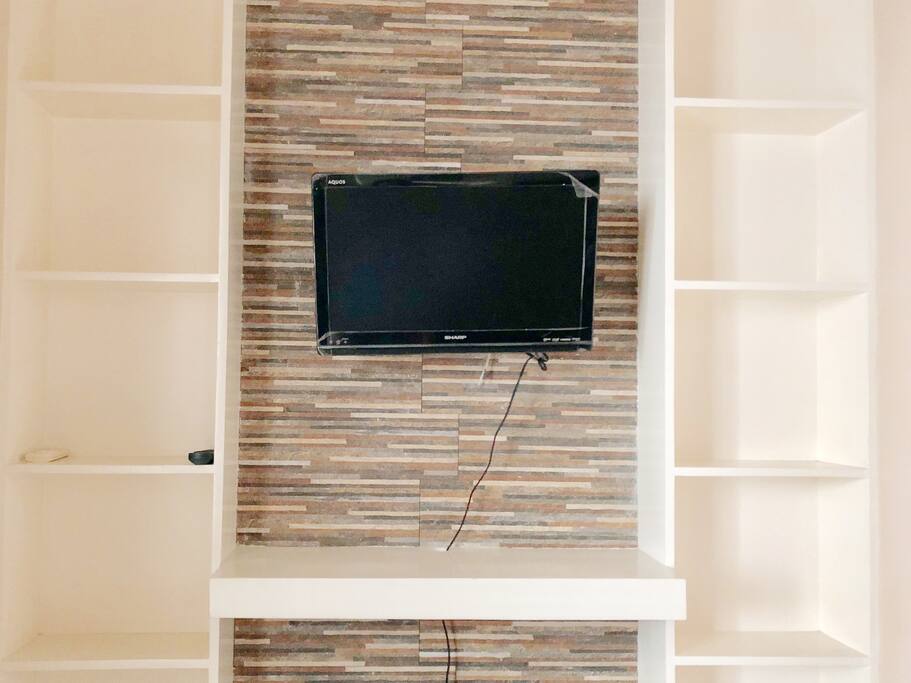 Walled TV wherein you can connect your USB/hard drive to watch your movies & tv series! My apologies, the screen protector is peeling off :/