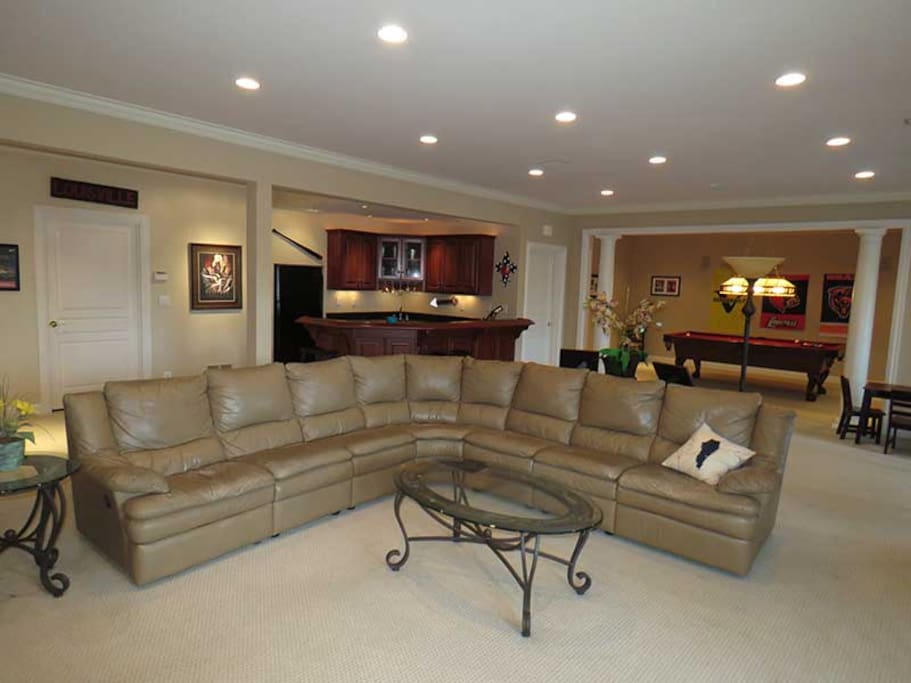 Basement has lots of space and is great for movies, billiards, or bar fun.