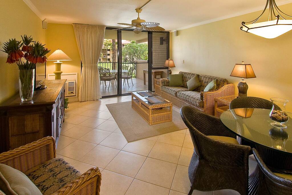 living room with cable TV, surround sound, and private lanai