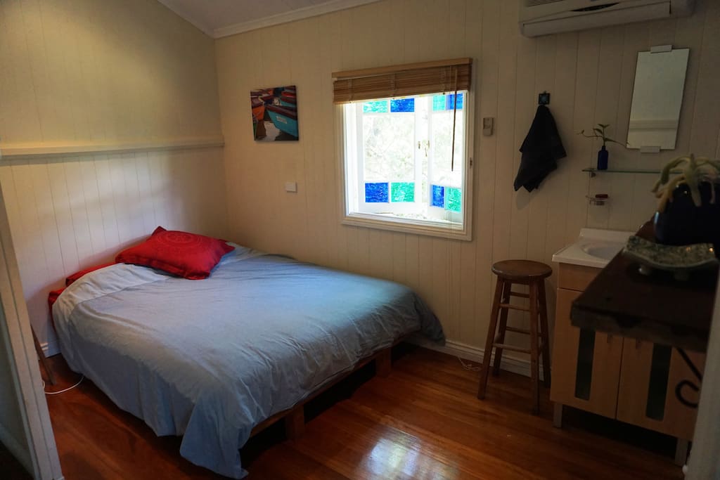Bedroom Two - Has a sink and cupboards. The room is cool and private.